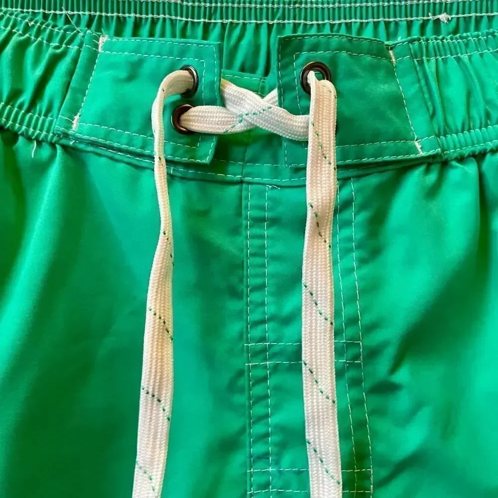 GREEN BOARD SHORTS SIZE MEDIUM BY ST JOHN’s BAY